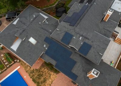 Overhead Shot. Showing how well the panels match the roof. Notice the conduit bends and quality installation.